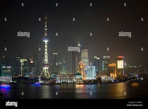 The Famous Pudong Skyline At Night Seen From The Bund Shanghai China