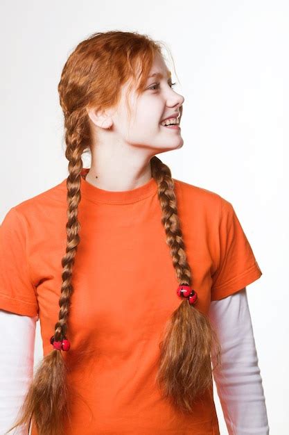 Premium Photo Picture Of Lovely Redhead Girl With Long Braids