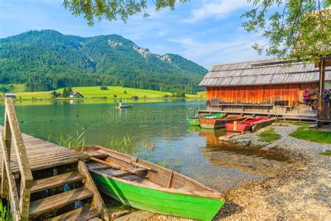 Weissensee Lake Austria Jul 6 2015 Green Fishing Boat On Shore Of