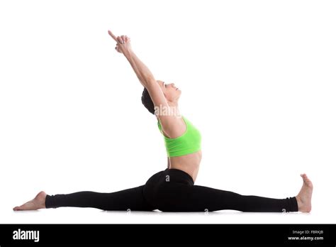 Beautiful Athletic Girl On White Background Sitting In Splits Monkey