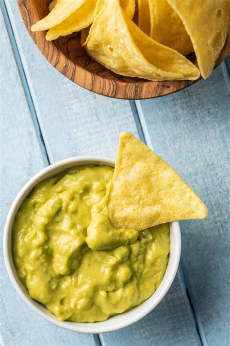 Corn Nacho Chips And Avocado Dip Yellow Tortilla Chips And Guacamole