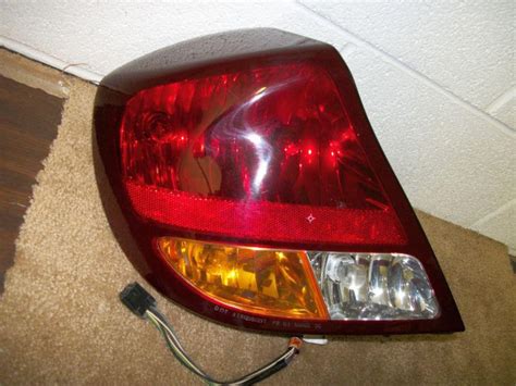 Sell Oldsmobile Aurora Left Tail Light Oem In Center