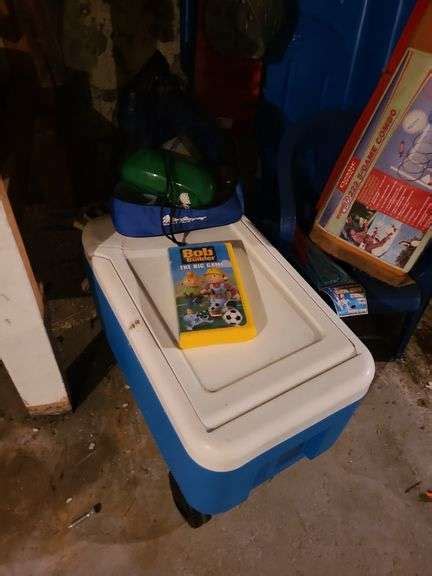 Outdoor Toys Cooler And Plastic Chair In Basement Ness Bros Realtors