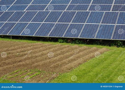 Solar Panels in the Garden 3 Stock Photo - Image of blue, environmental ...