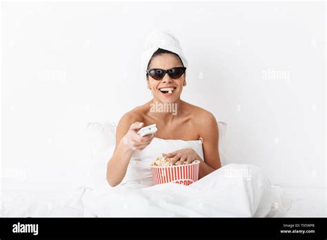 Image Of A Beautiful Happy Excited Woman With Towel On Head Lies In Bed