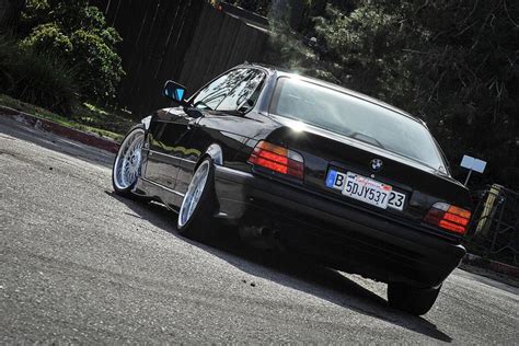 Sleek Black Bmw E36 Coupe With Stylish Bbs Rc Wheels