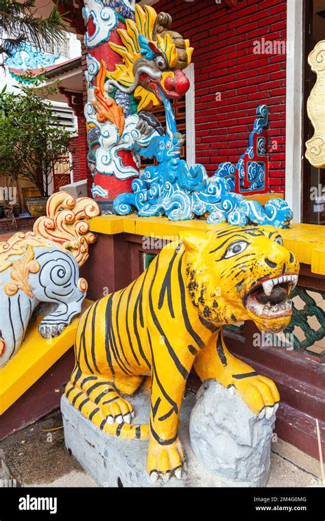 Tiger statue and symbolic carvings, Tran Hung Dao temple, Ho Chi Minh ...