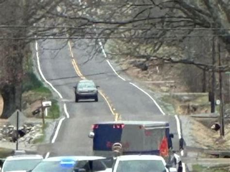 Car Crashes Into Utility Pole Causing Road Blockage