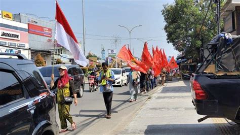 Melintasi Kota Cilegon Puluhan Petani Riau Lakukan Aksi Jalan Kaki