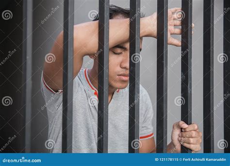 Man In Jail Behind Bars Stock Image Image Of Cell Dark