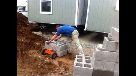 Mobile Home Re Leveling Using The Duraskirt Retrofit Cart And Block