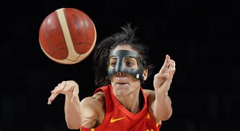 Spain advances, sweeps group with 76-66 victory over Canada | AP News