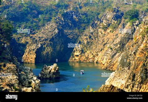 Tourist Boat Going Into The Marble Rocks Gorge On The Narmada River