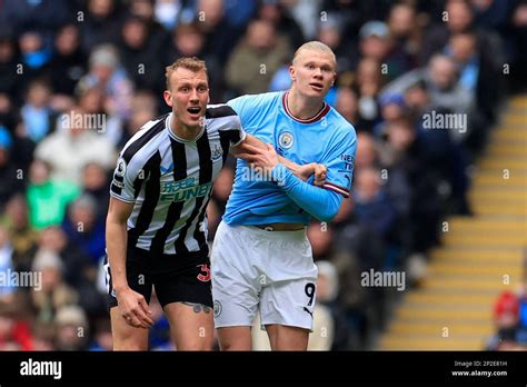 Erling Haaland Of Manchester City Is Marked By Dan Burn Of