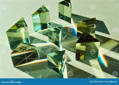 Group Of Triangular Clear Prism Refracts And Reflects The Light In