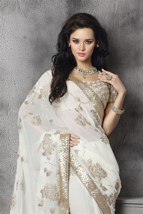 Alluring White Color Saree Edged With Golden Border Saree Beautiful Saree Party Wear Sarees