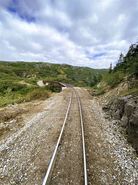 Train Tracks Running Through A Mountain Range Stock Photo Image Of