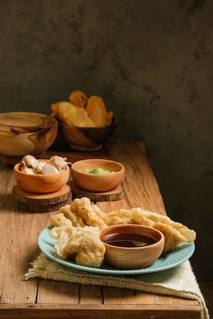 Premium Photo Pempek Served On Rustic Wooden Table Pempek Is