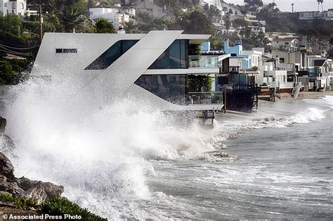 Massive Waves Smash Into Million Dollar Homes Along Malibu Coastline As