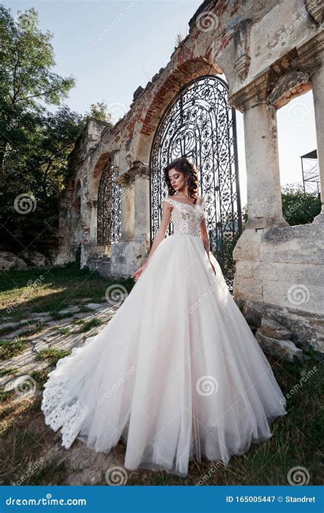 A Woman In A Wedding Dress Enjoying Happy Moments Of The Happiest