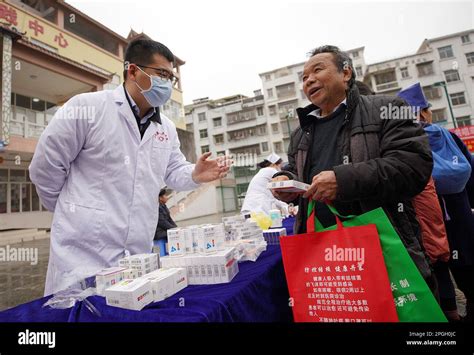 QIANDONGNAN, CHINA - MARCH 23, 2023 - Volunteers teach people about ...