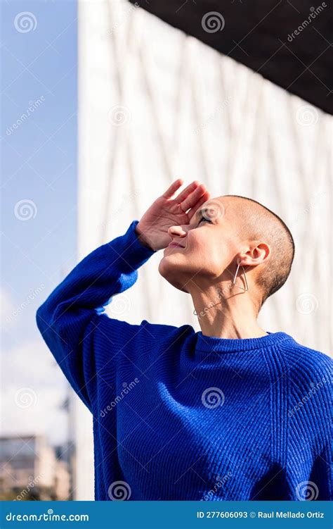 Confident Woman With Shaved Head Looking To Sky Stock Image Image Of