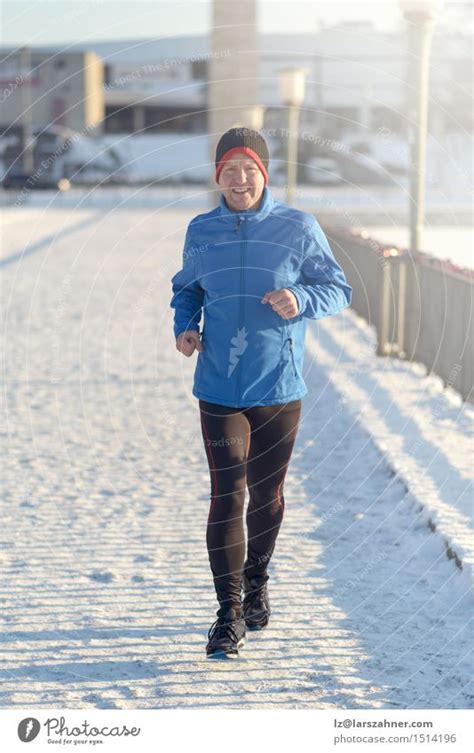 Man Jogging In Winter Clothing A Royalty Free Stock Photo From Photocase