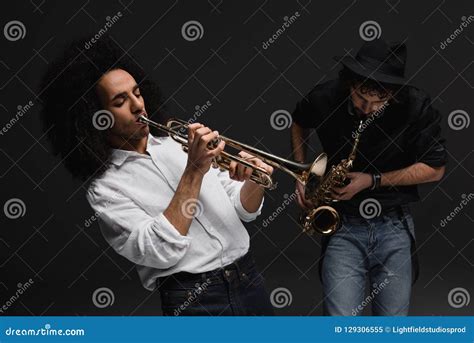 Duet of Musicians Playing Trumpet and Sax Stock Image - Image of ...