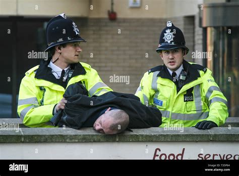 2 Police Officers Arrest A Drunk Man In Reading Town Centre In The