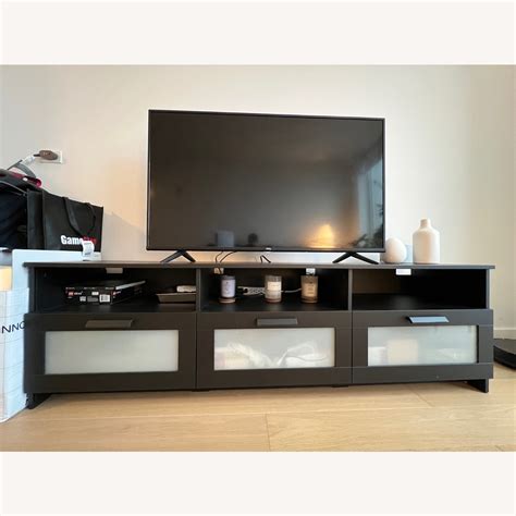 IKEA Black Wood TV Stand - AptDeco