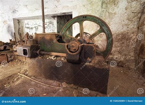 Old Abandoned Industrial Machine Tools And Rusty Metal Equipment In