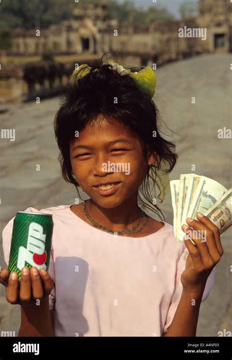 Beautiful Young Smiling Cambodiangirl At Angkor Wat Temple Complex