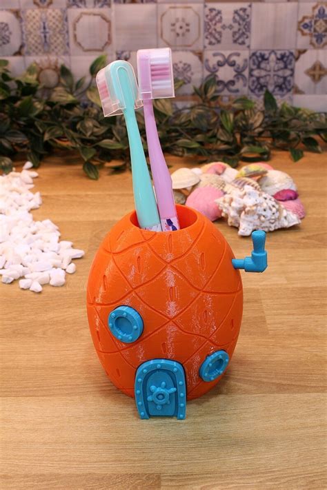 Fondo de bikini de Bob Esponja Casa de piña alcancía dispensador de jabón organizador