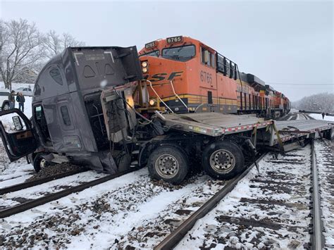 Freight Train Strikes Stuck Semi Pushes It Two Blocks Down The Tracks