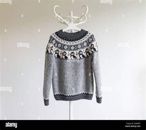 Photo Of A Knitted Grey Wool Lopapeysa Sweater In Traditional Icelandic