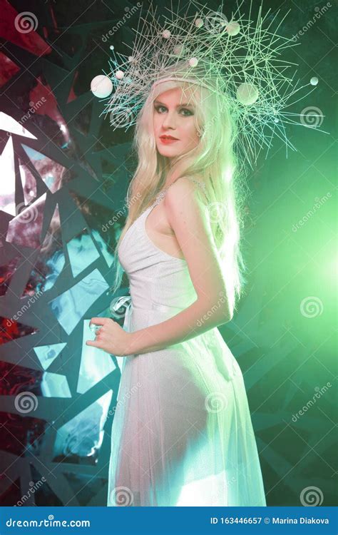 Hot Strange Slender Woman With Long Blonde Hair Wearing White Dress And