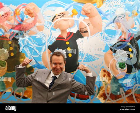 American Artist Jeff Koons Poses In Front Of Triple Popeye At