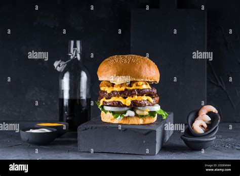 beef burger with cheese and sauce Stock Photo - Alamy