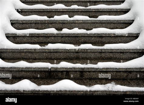 Stairs with snow Stock Photo - Alamy