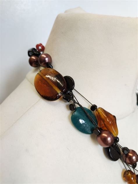 Chunky Multi Strand Glass Bead Statement Necklace In Blue Brown Black