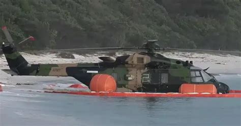 Austr Lia Suspende Opera Es De Helic Pteros Nh Ap S Pouso Na Gua