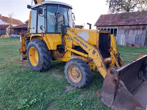 Kombinirka Bager Skip John Deere Bageri Olx Ba