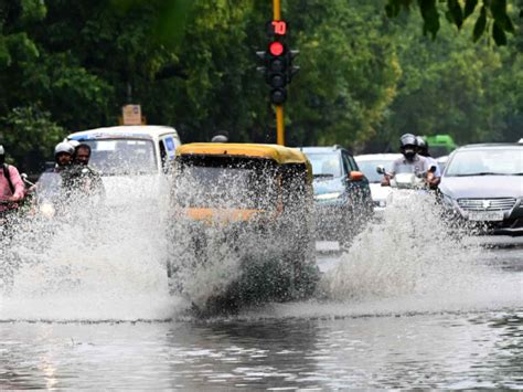 Rain In Delhi Causes Waterlogging Traffic Snarls