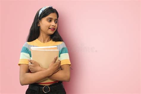 Cute Assertive Indian Asian Cheerful Girl Standing Isolated With Both Raise Hands Up Pointing