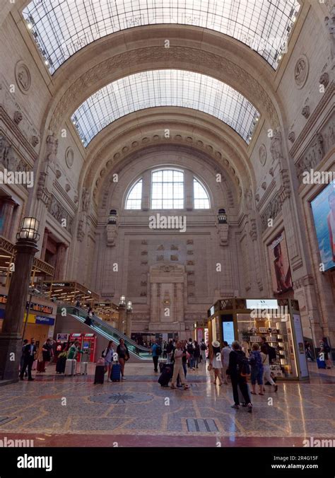 Interior Of Milan Centrale Railway Station Travellers Wheel Their