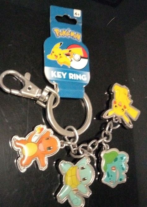 Mavin New Nintendo Pokemon Metal Keychain Pikachu Charmander