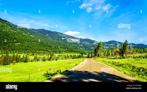 Farm Fields Meadows And Mountains Along The Heffley Louis Creek Road