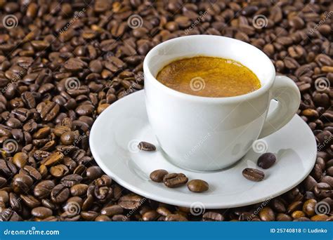 Fresh Espresso At Roasted Coffee Beans Royalty Free Stock Photos