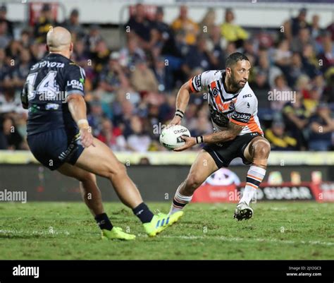 Benji Marshall of the Tigers looks to pass the ball during the Round 14 ...