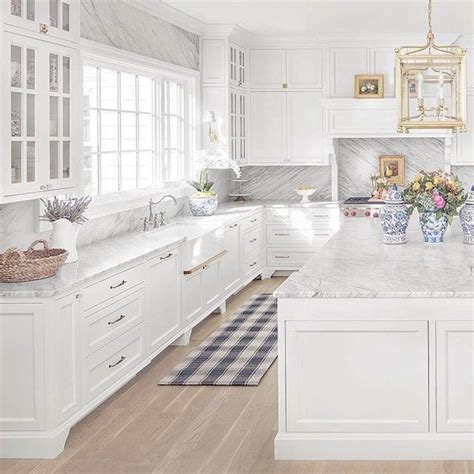 The Instagram Page Shows An Image Of A White Kitchen